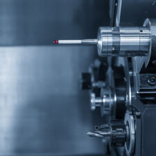 The touching probe attach at the turret on CNC lathe machine. The quality control on turning machine by touching probe.